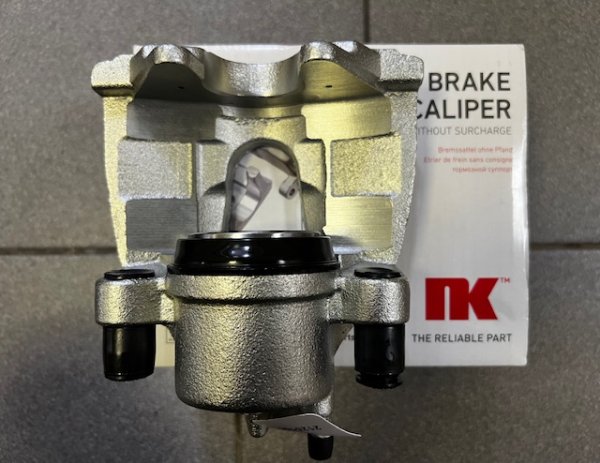 Суппорт тормозной передний Форд Фокус-2,3 левый NK