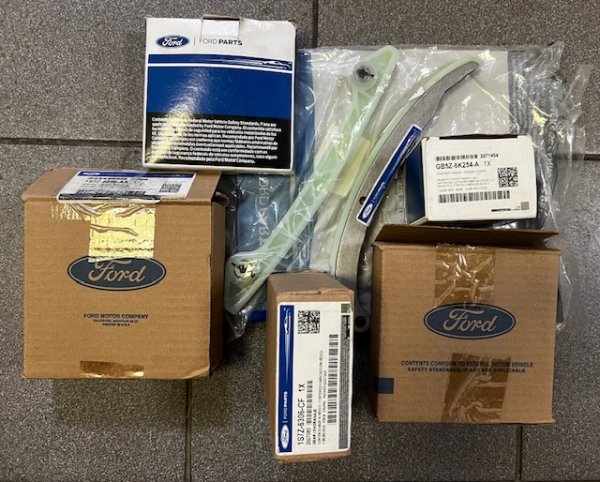 Цепь ГРМ Форд Фокус-2 1.8-2.0 л набор (башмак, успокоитель, натяжитель, звездочки распредвалов и коленвала) оригинал